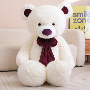 Ivory the Bear – Oversized Cream Plush Teddy Bear with Deep Red Bow